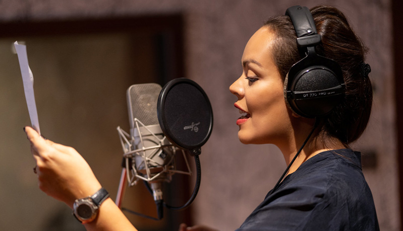 Rita performing the word