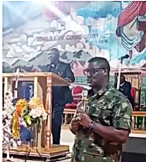Nigerian Army representative addresses the Rev. Ezekiel Dachomos church, offering protection.