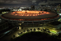 Aerial view of Maracana Stadium lit with golden lights in tribute to late football legend Pelé on December 29, 2022 in Rio de Janeiro, Brazil.
