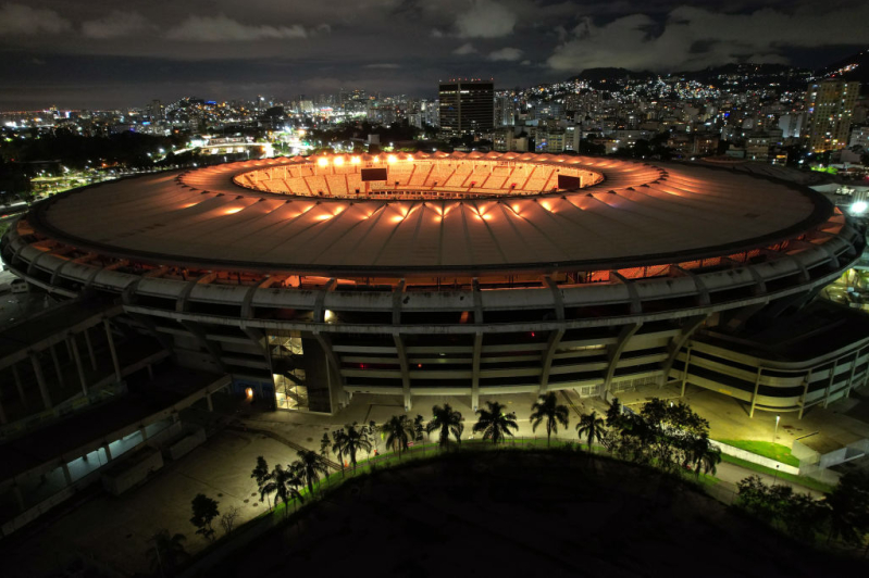Aerial view of Maracana Stadium lit with golden lights in tribute to late football legend Pelé on December 29, 2022 in Rio de Janeiro, Brazil.