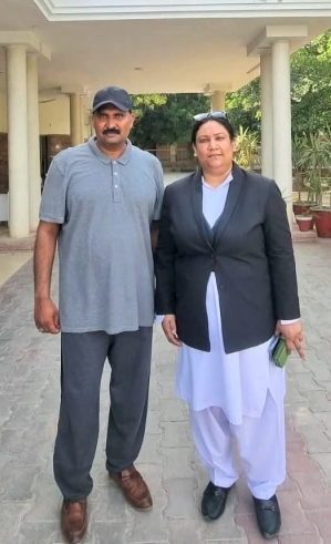 Haroon Shahzad with attorney Aneeqa Maria.