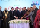 Prime Minister Shehbaz Sharif cuts the Christmas cake with Christian leaders and government officials at a special ceremony held at the PMs House on Dec 25, 2025.