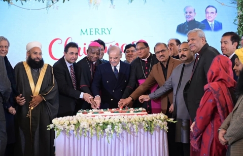 Prime Minister Shehbaz Sharif cuts the Christmas cake with Christian leaders and government officials at a special ceremony held at the PMs House on Dec 25, 2025.
