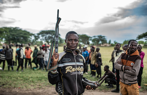 A Wazalendo militant surrenders a weapon to members of the Rwanda-backed M23 rebel group in Uvira, eastern Democratic Republic of Congo, days after the rebels captured the South Kivu city.