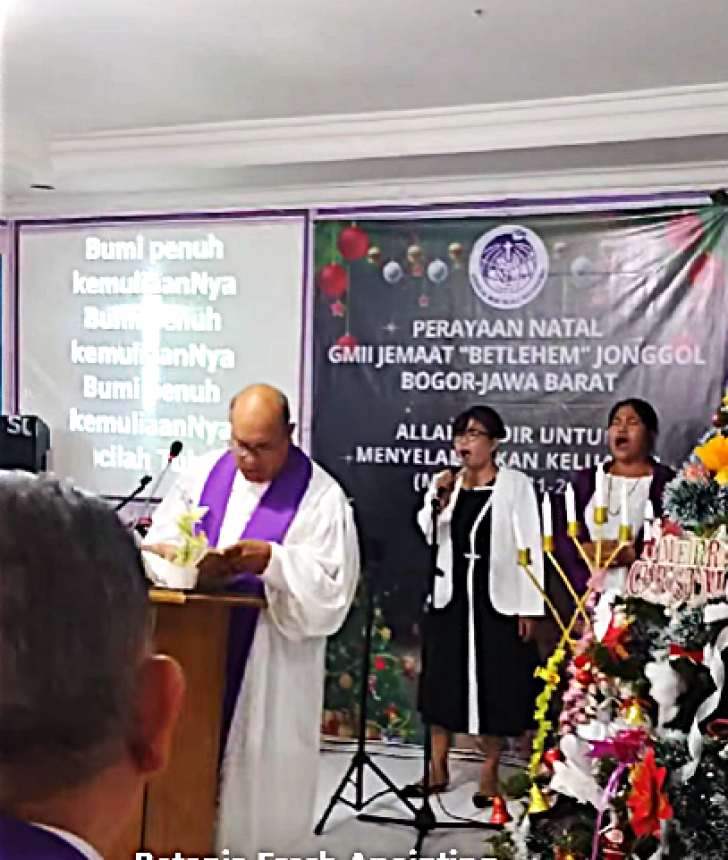 Pastor Irianto Budy of GMII Bethlehem church leading service in Sukasirna village, Jonggol District, West Java Province, Indonesia.