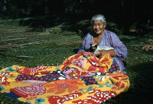 A woman works on a tivaivai, a traditional hand-stitched quilt, an art form discussed in a recent All Things Reconciled podcast episode exploring how Indigenous creative practices can foster healing, cultural identity and reconciliation.