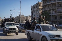 ALEPPO, SYRIA — Syrian army soldiers are seen in the Sheikh Maqsoud neighborhood after clashes with Kurdish fighters in January 2026.