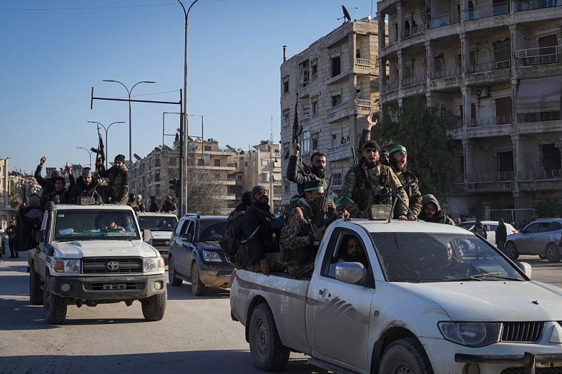 ALEPPO, SYRIA — Syrian army soldiers are seen in the Sheikh Maqsoud neighborhood after clashes with Kurdish fighters in January 2026.