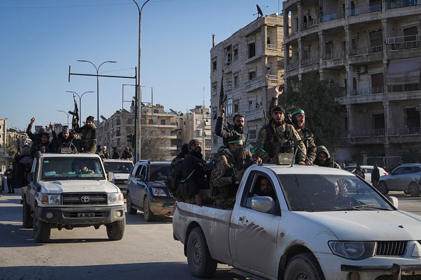 ALEPPO, SYRIA — Syrian army soldiers are seen in the Sheikh Maqsoud neighborhood after clashes with Kurdish fighters in January 2026.