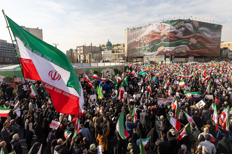 A crowd gathers during a pro-government rally on January 12, 2026 in Tehran, Iran.