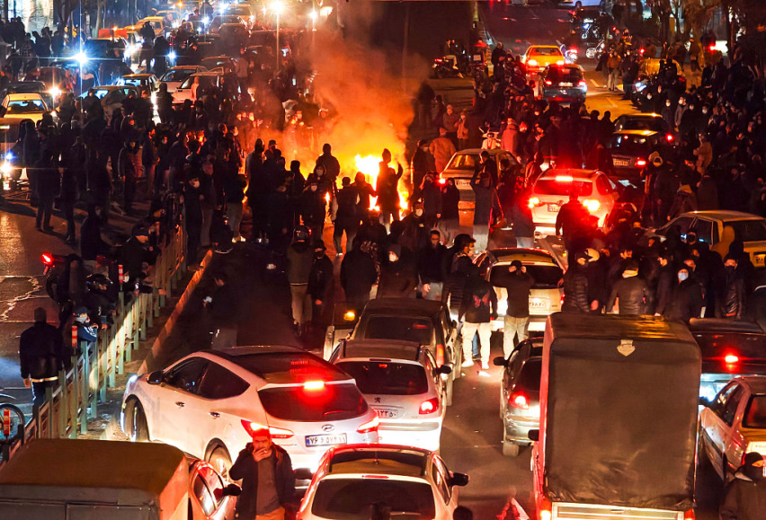 TEHRAN, IRAN - JANUARY 8: People gather during protest on Jan. 8, 2026 in Tehran, Iran. Demonstrations have been ongoing since December, triggered by soaring inflation and the collapse of the rial, and have expanded into broader demands for political chan