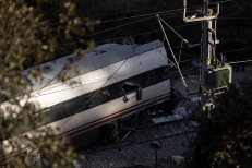 A crashed train remains on the train tracks on January 19, 2026 after yesterdays train collision in Adamuz, Spain.