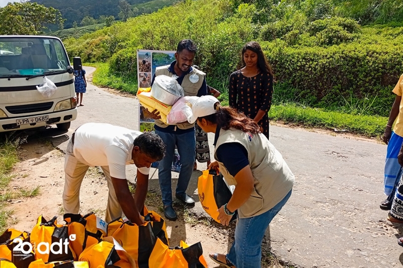 Relief workers distribute food and essential supplies to families affected by Cyclone Ditwah in a rural area of Sri Lanka, as churches and local volunteers continue recovery efforts weeks after widespread flooding and destruction.