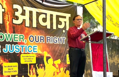The Rev. Richard Howell addresses rally against persecution of Christians in Jantar Mantar, New Delhi on Aug. 22, 2025.