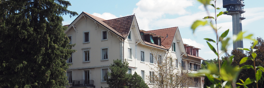 Haus zu den Bergen, part of the Chrischona Berg campus in Bettingen, Switzerland, was sold by the Theological Seminary St. Chrischona as part of a restructuring plan to refocus on theological education and reduce debt.