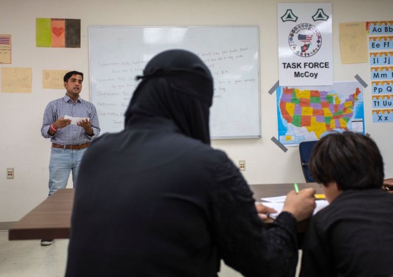 Afghan refugees take an educational class at Ft. McCoy U.S. Army base