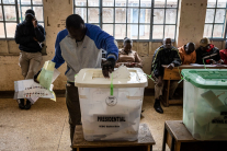 NAIROBI, KENYA — Voters place ballots into boxes at a Nairobi polling station during Kenya’s 2022 general election. The IEBC says lessons from that vote are shaping preparations for 2027.