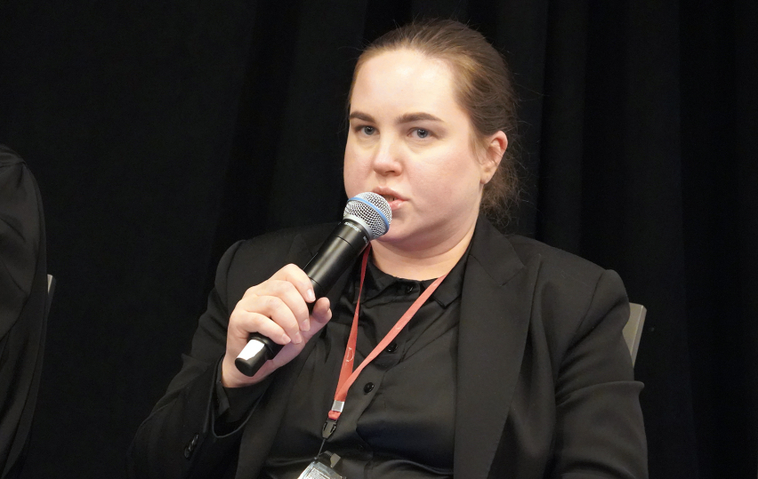 Vira Iastrebova, director of the Eastern Human Rights Group, addresses participants at the International Religious Freedom Summit on Feb. 3, warning that the Russian Orthodox Church is being used to militarize children and youth through paramilitary camps