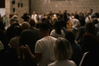 Worshipers gather during a church service in the United States, where a new Pew Research Center study finds that most Americans believe in God and pray regularly, even as nearly half say they seldom or never attend religious services.