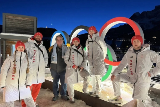IMB missionary Charlie Worthy poses for a photo with members of the Polish luge team.