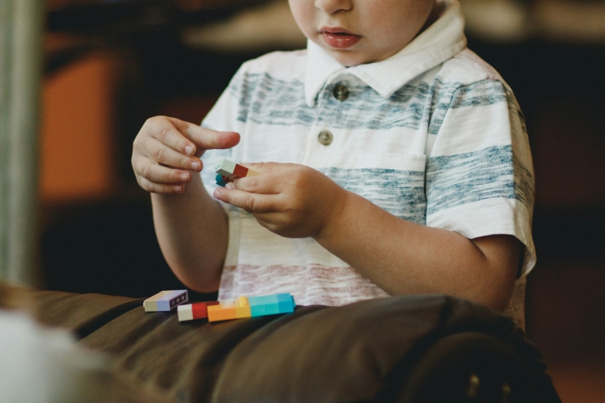 child with lego