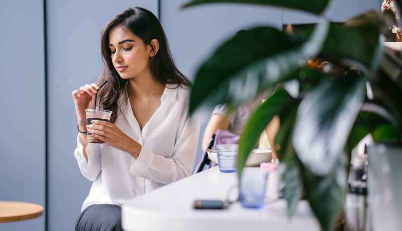 Young Indian Woman at Café