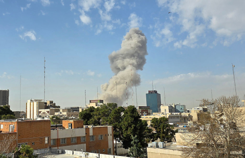 TEHRAN, IRAN - FEBRUARY 28: A plume of smoke rises after an explosion on February 28, 2026 in Tehran, Iran. After explosions were seen in the Iranian capital, the office of the Israeli Defense Minister issued a statement saying it had launched a preemptiv