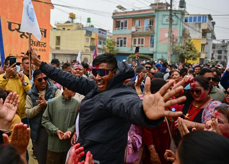 Supporters of Rashtriya Swatantrata Party (RSP) celebrate after the winning of Rajiv Khatri, a candidate from RSP on March 07, 2026 in Kathmandu, Nepal.