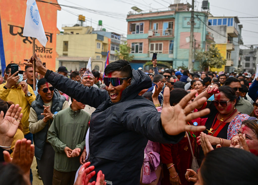 Supporters of Rashtriya Swatantrata Party (RSP) celebrate after the winning of Rajiv Khatri, a candidate from RSP on March 07, 2026 in Kathmandu, Nepal.