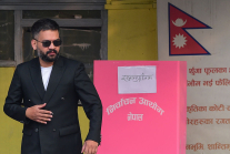 Balendra Shah, a leading figure of the Rastriya Swatantra Party (RSP) and a candidate for prime minister, leaves a polling station after casting his vote during Nepal’s parliamentary elections in Kathmandu.