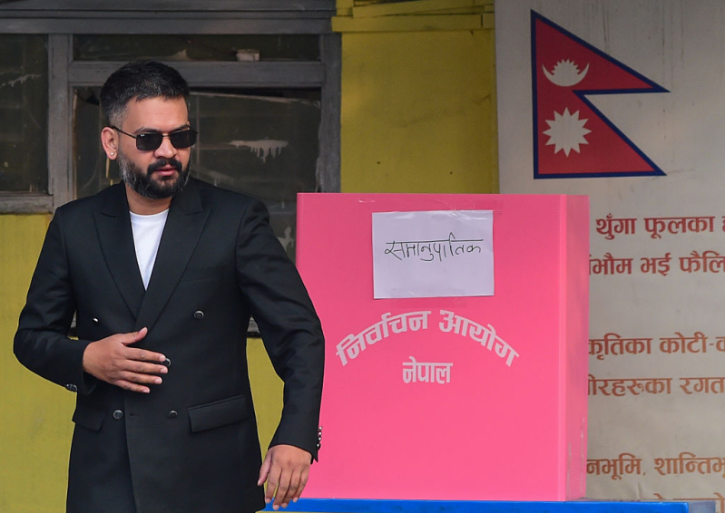Balendra Shah, a leading figure of the Rastriya Swatantra Party (RSP) and a candidate for prime minister, leaves a polling station after casting his vote during Nepal’s parliamentary elections in Kathmandu.