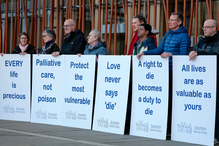 Members of the Scottish Family Party demonstrate against the assisted dying bill, as Scottish Parliament holds the final vote on the Assisted Dying Bill on March 17, 2026 in Edinburgh, Scotland.