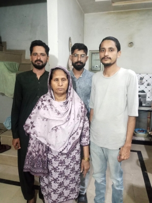 Naseem Bibi and her sons, deprived of their Christian identity in Pakistans national database despite court orders.