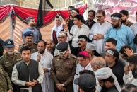 Faisalabad Police Chief Kamran Adil shows solidarity with Christians in Jaranwala, Pakistan on Aug. 16, 2024.