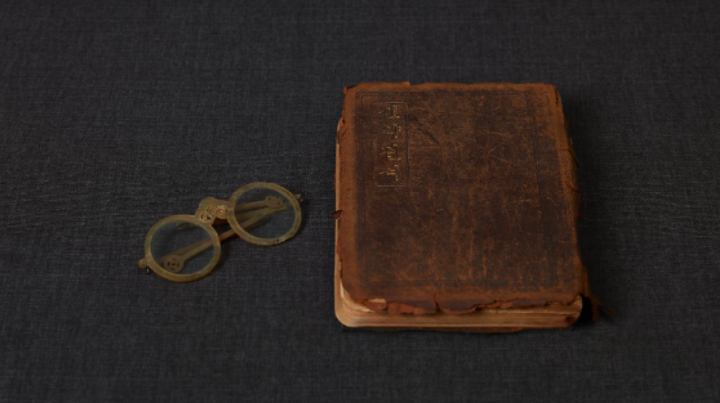 Missionary Welborns Bible and glasses.
