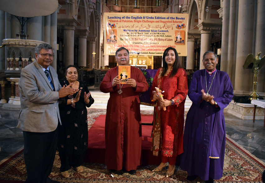 Bishop of Lahore Rt. Rev. Nadeem Kamran unveils the book by Anthony Aijaz Lamuel during its launch in Lahore, highlighting calls for accountability and renewal within the Church of Pakistan.