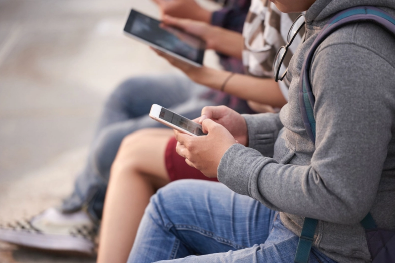 youth with cellphones