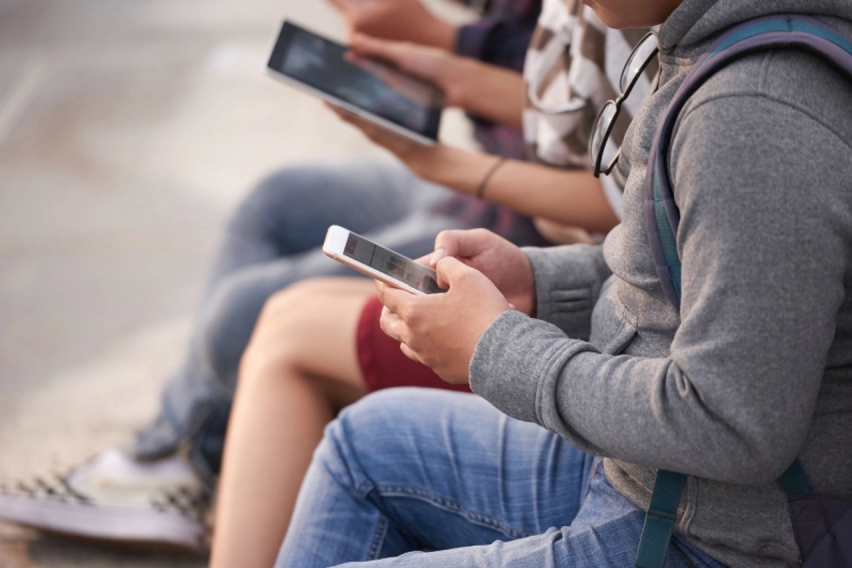 youth with cellphones