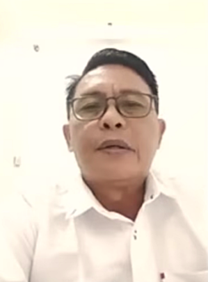 Pastor Novel Pangemanan in video call with rights group about April 14, 2026 halt to construction of prayer house in Kappuna village, North Luwu Regency, Indonesia.