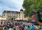Visitors gather in the courtyard of the Buchenauerhof during the 75th anniversary event hosted by the German missions organization DMG, which drew more than 3,000 attendees for intercultural worship services, exhibitions and mission-related activities.