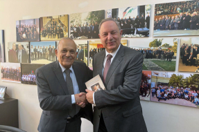 Retired Maj. Gen. Imad Maayah (left), president of Jordans Evangelical Council, shakes hands with Sen. Michael Nazzal following their meeting in Amman.