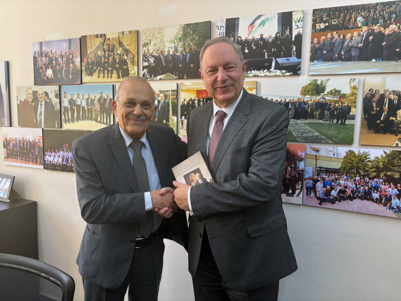 Retired Maj. Gen. Imad Maayah (left), president of Jordans Evangelical Council, shakes hands with Sen. Michael Nazzal following their meeting in Amman.