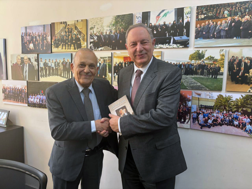 Retired Maj. Gen. Imad Maayah (left), president of Jordans Evangelical Council, shakes hands with Sen. Michael Nazzal following their meeting in Amman.