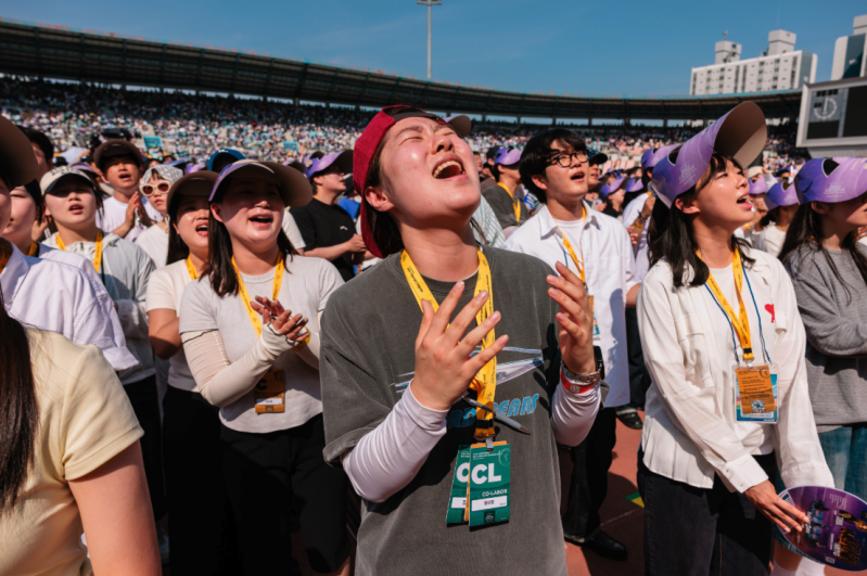 Young worshippers gather at the Uijeongbu Billy Graham Crusade on May 17, 2026, at the Uijeongbu Sports Complex in South Korea. The event drew more than 21,000 people from across northern Gyeonggi Province, with organizers describing it as a call for rene