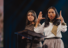 Vina, an Indonesian survivor of a 2021 church bombing, addresses roughly 9,000 attendees at the Open Doors Days gathering in Karlsruhe, Germany.