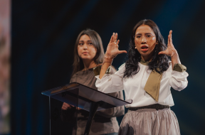 Vina, an Indonesian survivor of a 2021 church bombing, addresses roughly 9,000 attendees at the Open Doors Days gathering in Karlsruhe, Germany.