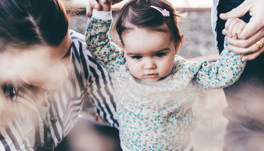 Child learning to walk