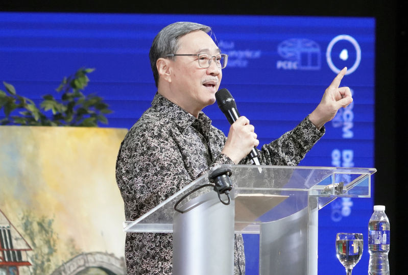 Rev. Edmund Chan addresses evangelical leaders at the Asia Conference on Church and Mission in Manila. Chan called on church leaders to become the delivery system for discipleship rather than relying on programs or curriculum.