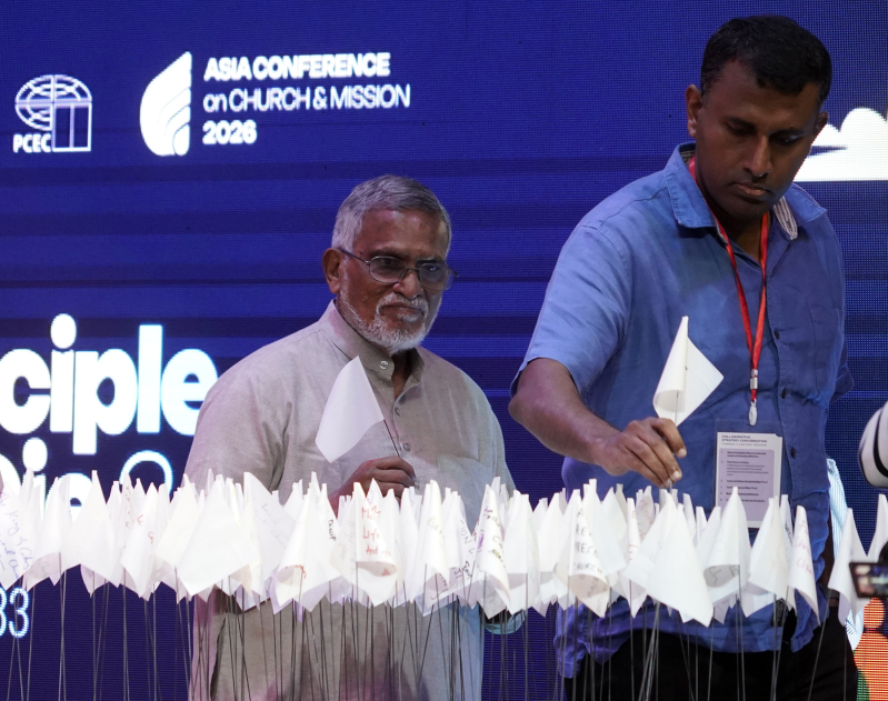 Delegates plant white flags bearing the names of churches they committed to help transition toward disciple-making during the closing ceremony of the Asia Conference on Church & Mission 2026 in Alabang, Metro Manila, June 11, 2026.