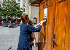 A voter and child are seen casting a ballot together in a proposal over whether to cap the countrys population at 10 million on June 14, 2026 in Lausanne, Switzerland.